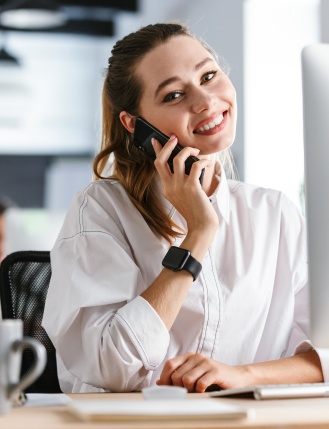 Happy young woman dressed in shirt